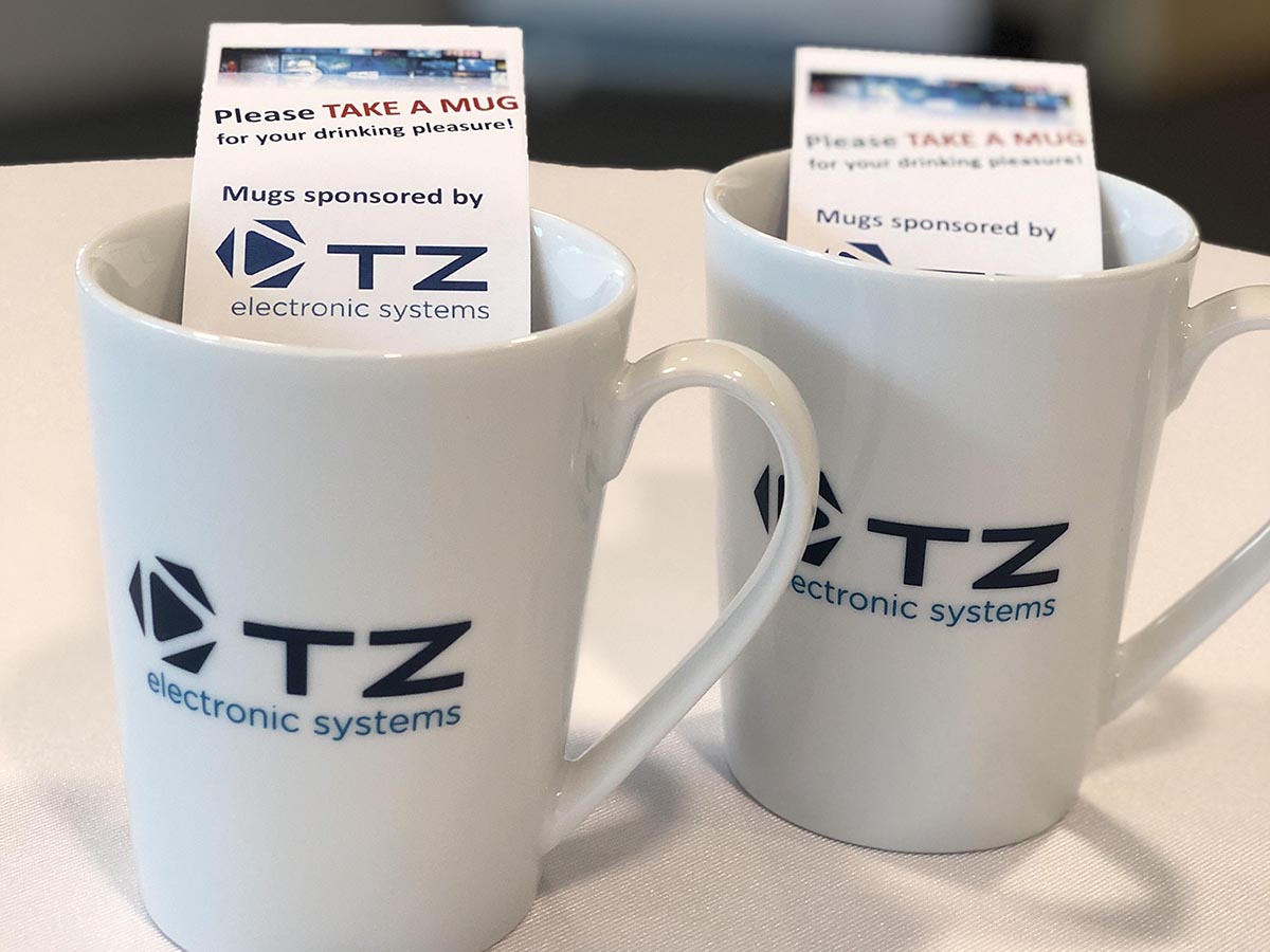 electronic displays Conference 2022 in Nuremberg: sponsored mugs from TZ